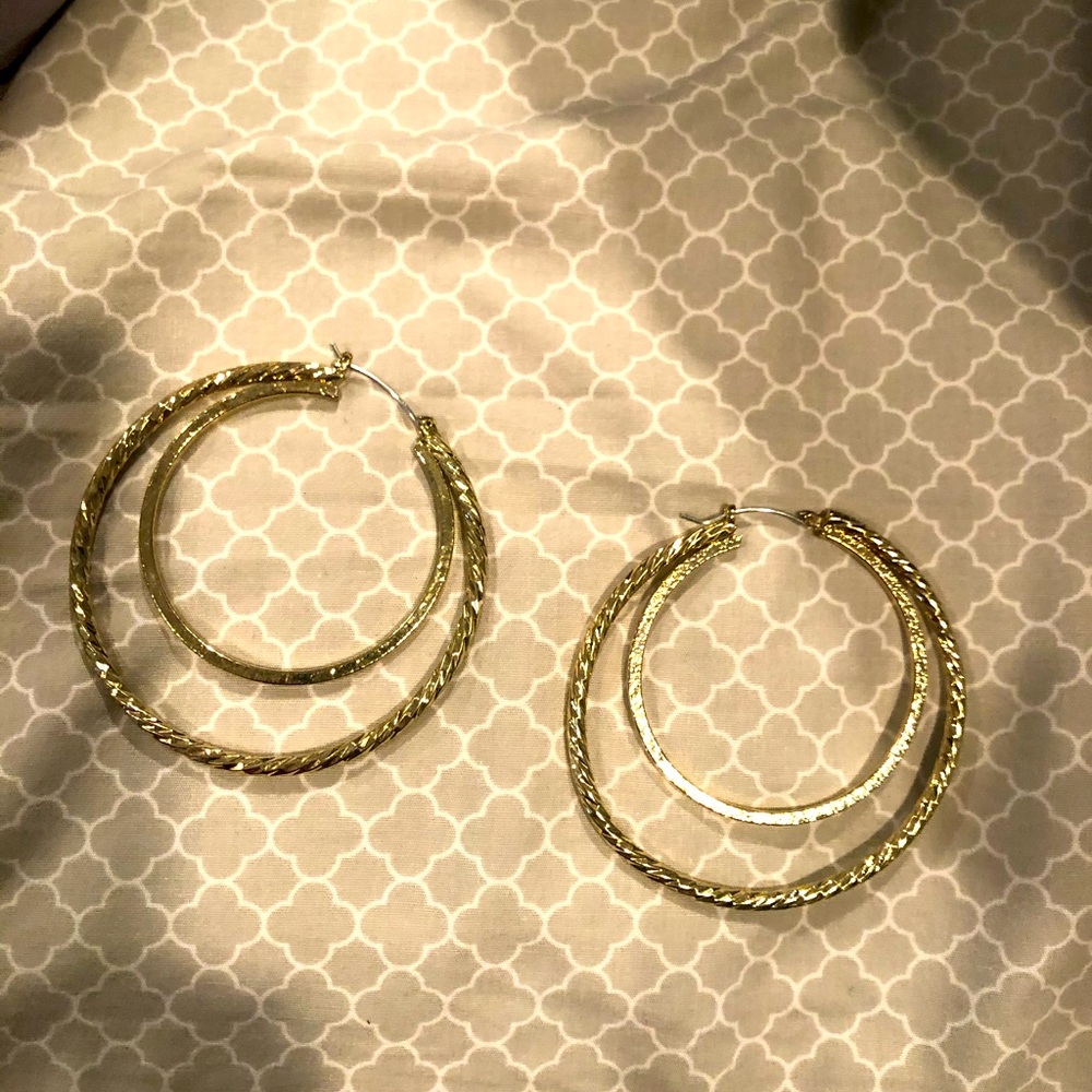 Large unique gold hoops with textured pattern!